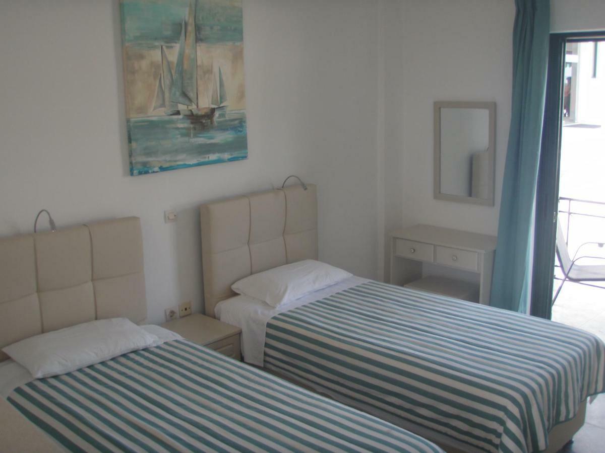 Umbrella Beach Apartments Kavos Luaran gambar
