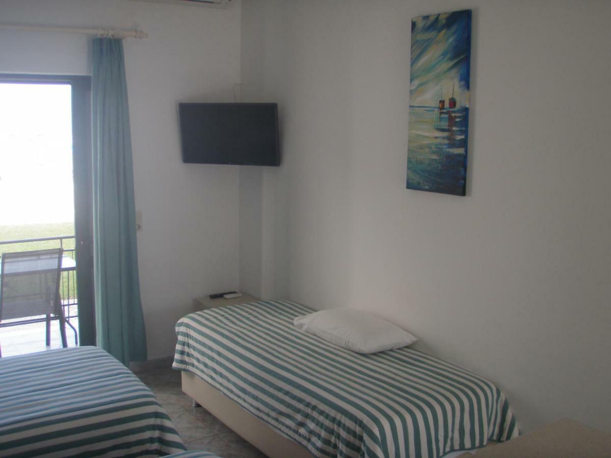 Umbrella Beach Apartments Kavos Luaran gambar